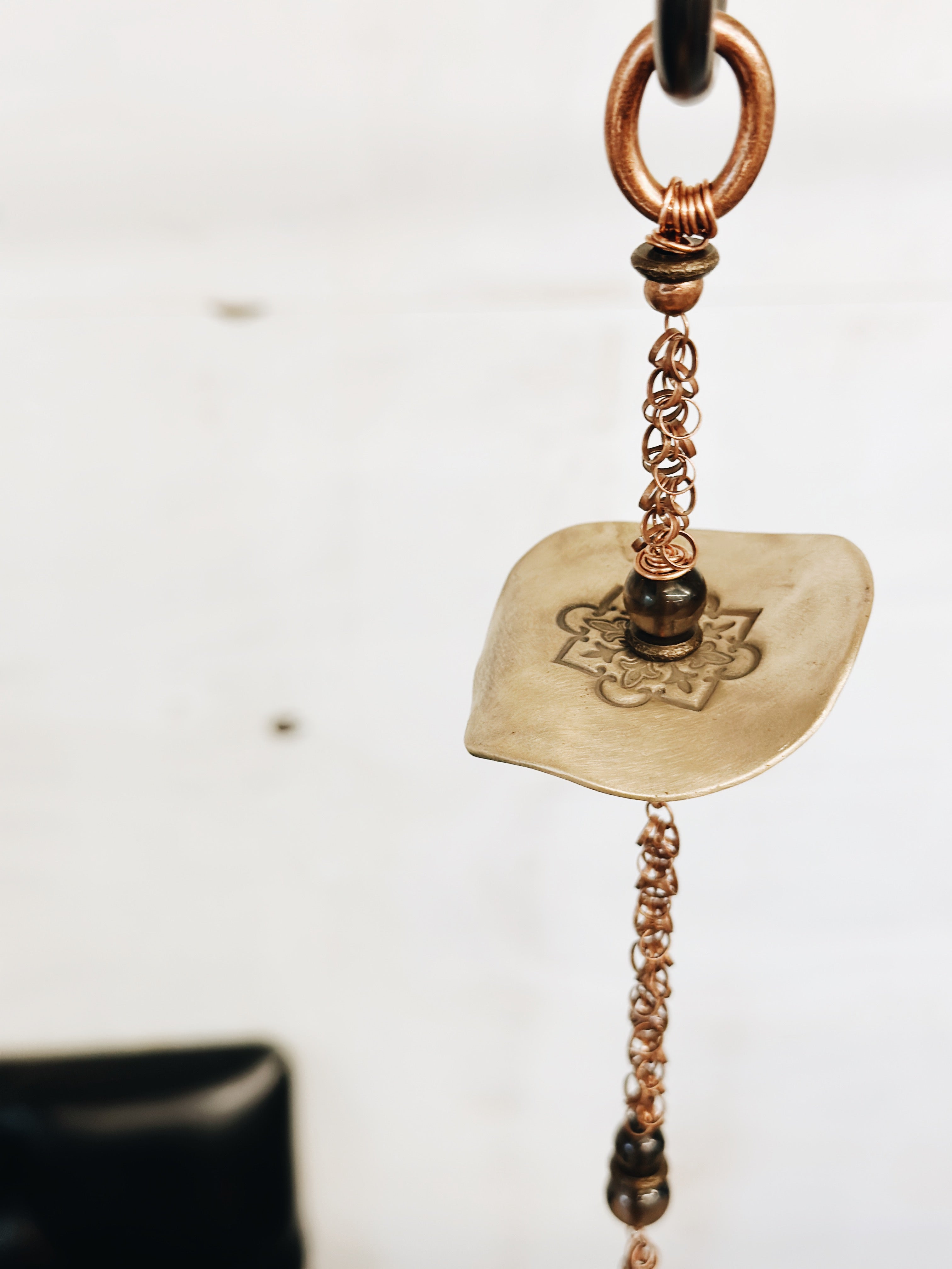 Unique handcrafted wind catchers and decorative wind spinners in ceramic and natural materials β artisan wind art by Jester Swink, Santa Cruz Mountains California