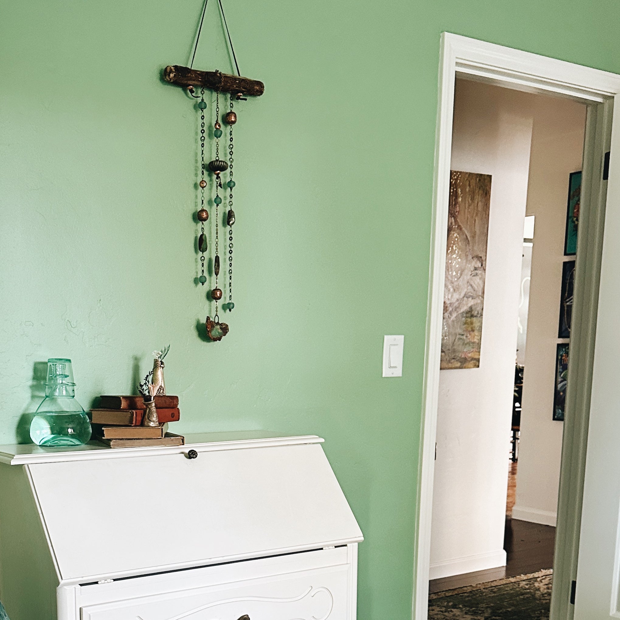 Wall hanging decor collection: Discover handcrafted wall hangings made with natural materials like wood, ceramic, and semi-precious stones. Find the perfect piece to elevate your home.