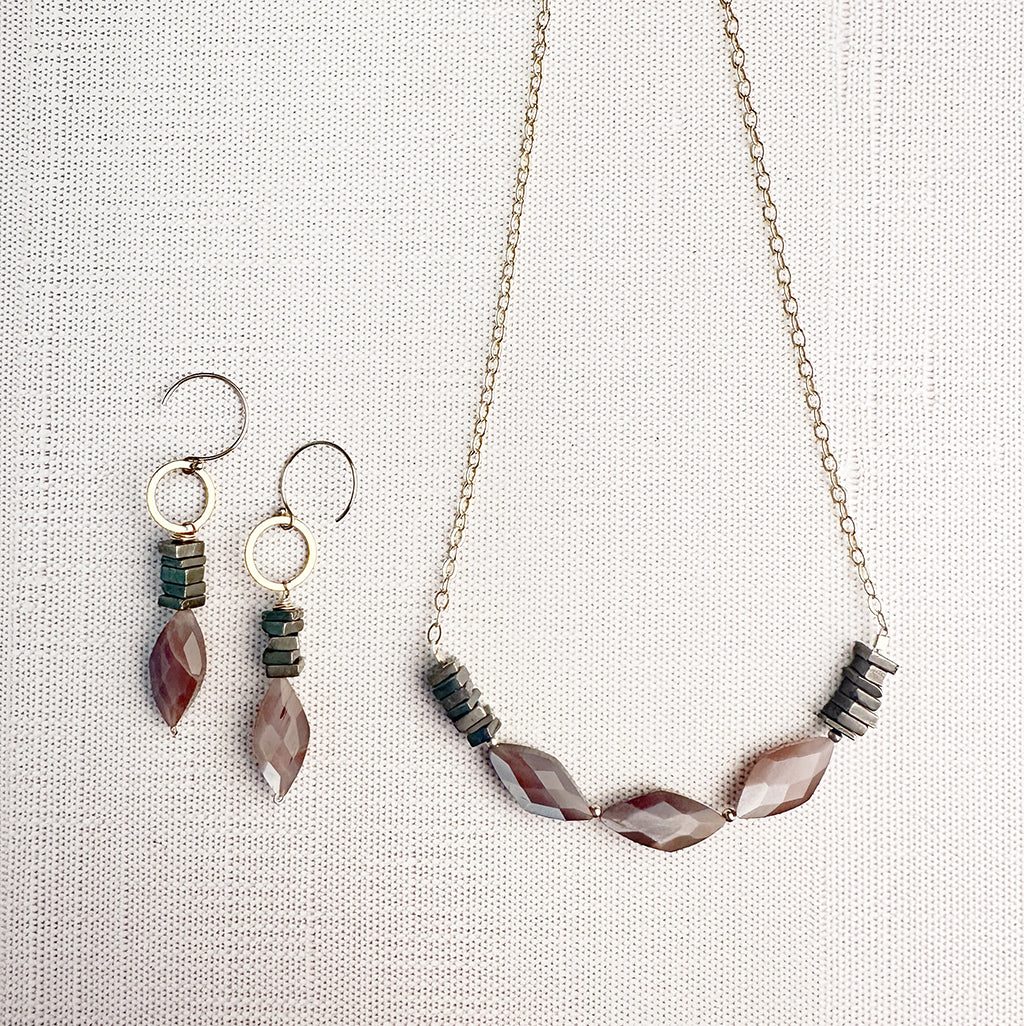 Moonstone & Pyrite Gold Dangle Earrings – Sleek Sophistication