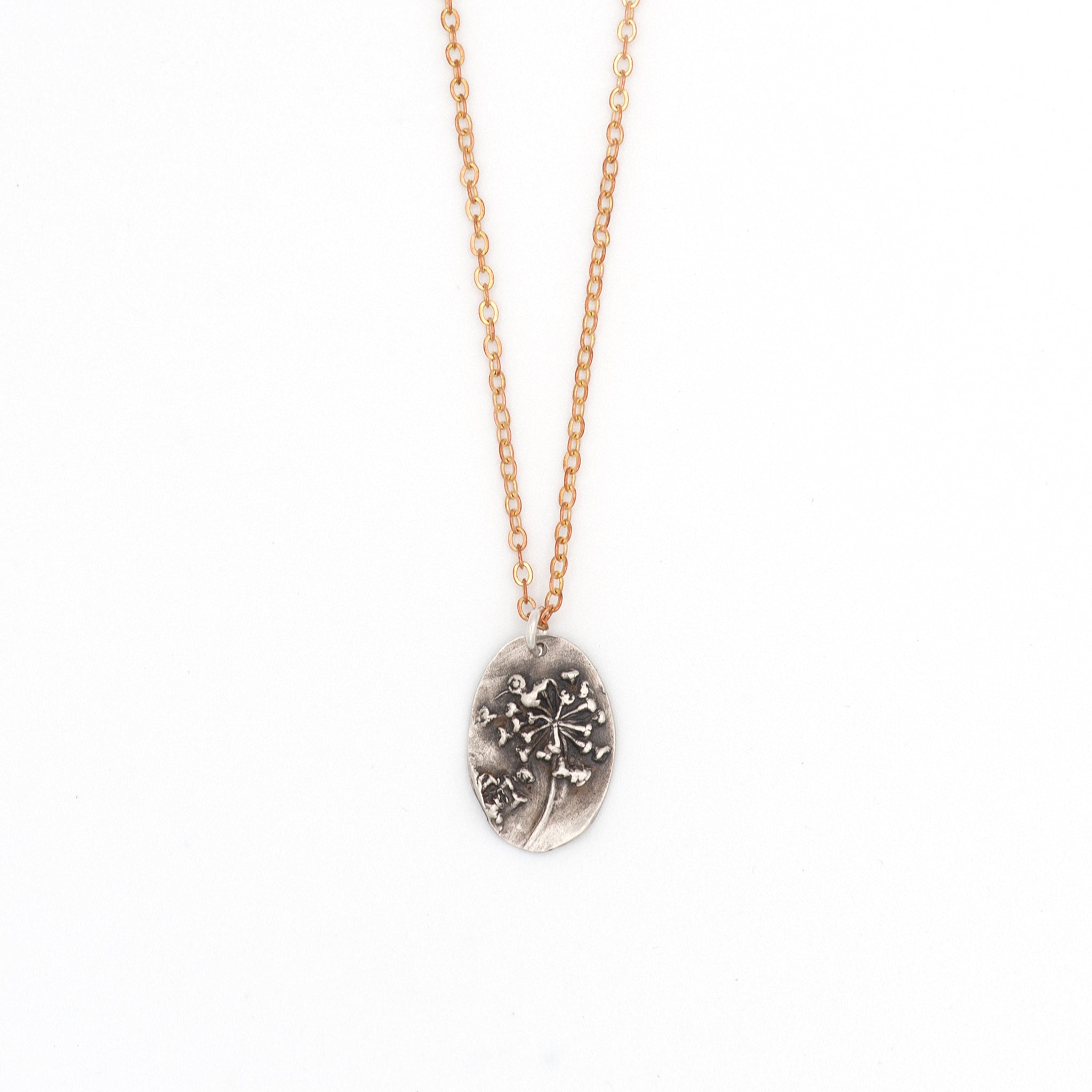 Handcrafted sterling silver fennel flower pendant necklace with 18-inch raw copper chain.