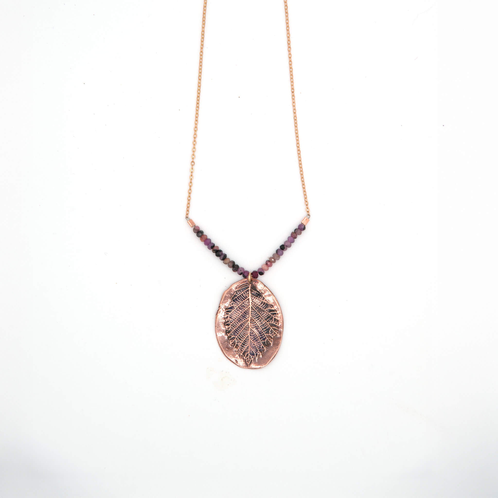 Wild Radiance handmade copper blackberry leaf necklace with pink ruby