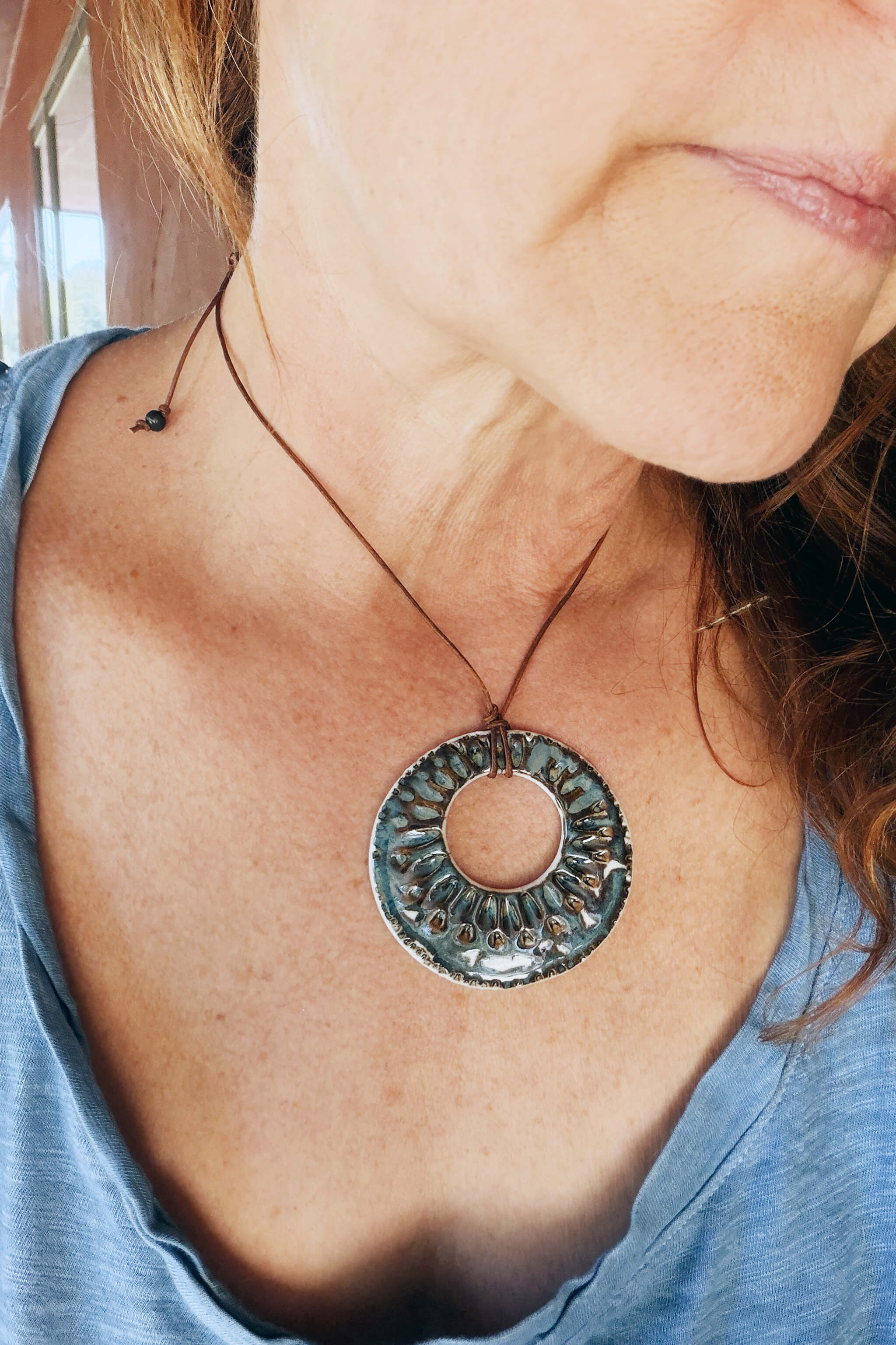 Handmade coastal ceramic ring pendant necklace worn at shorter length — boho beach jewelry From the Fire FTF_0726 by Jester Swink