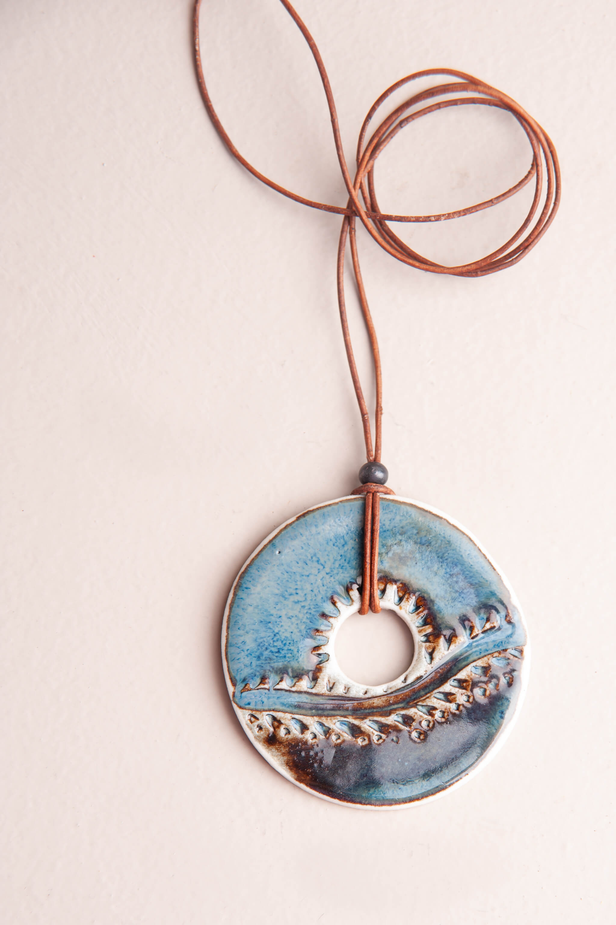 Handmade ceramic horizon pendant necklace with sunrise blue sky over earth brown on caramel Italian leather, kiln fired by Jester Swink Santa Cruz Mountains — From the Fire FTF_0726