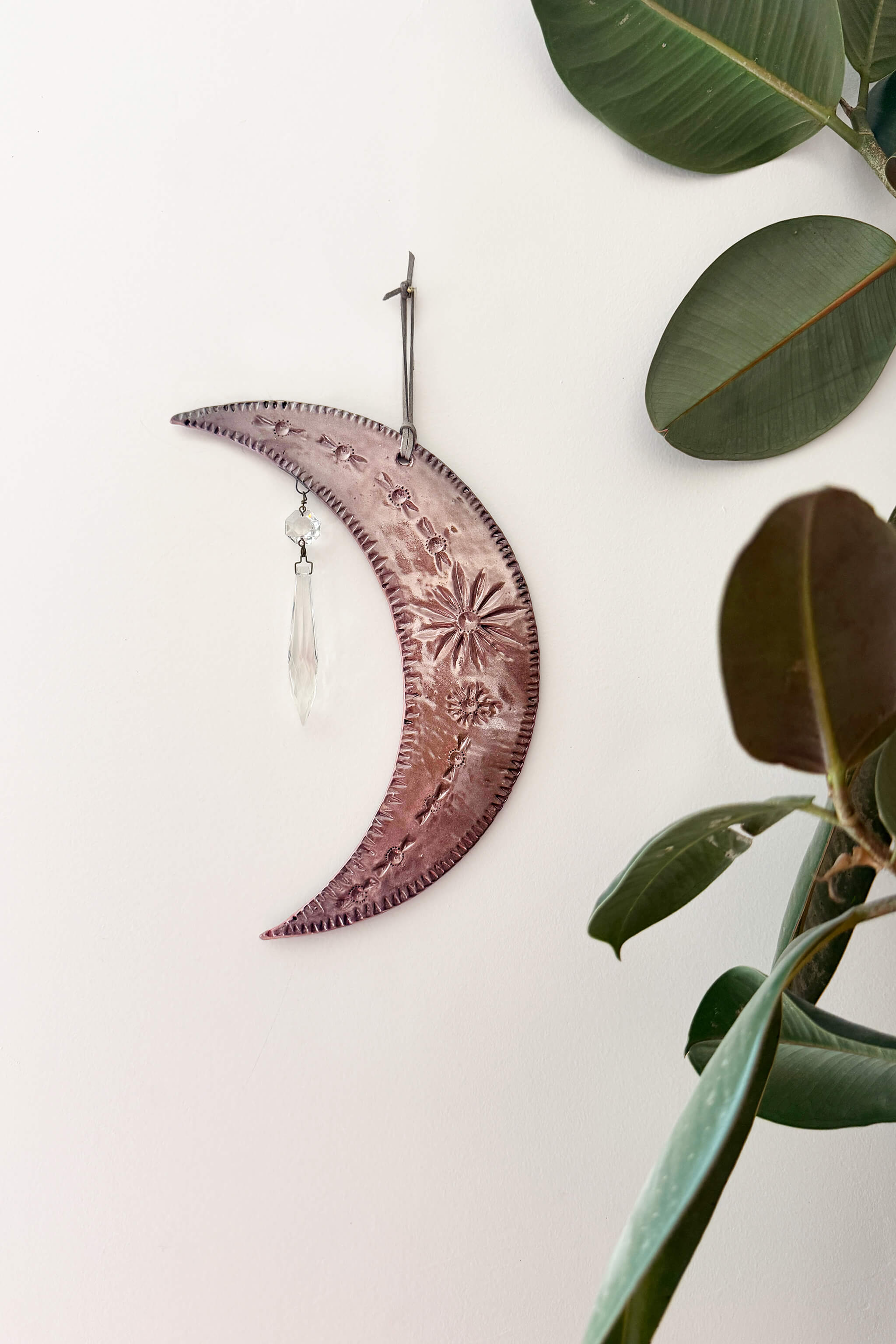 Handmade crescent moon wall hanging in chocolate brown styled with plants — boho celestial wall art by Jester Swink From the Fire FTF_0726