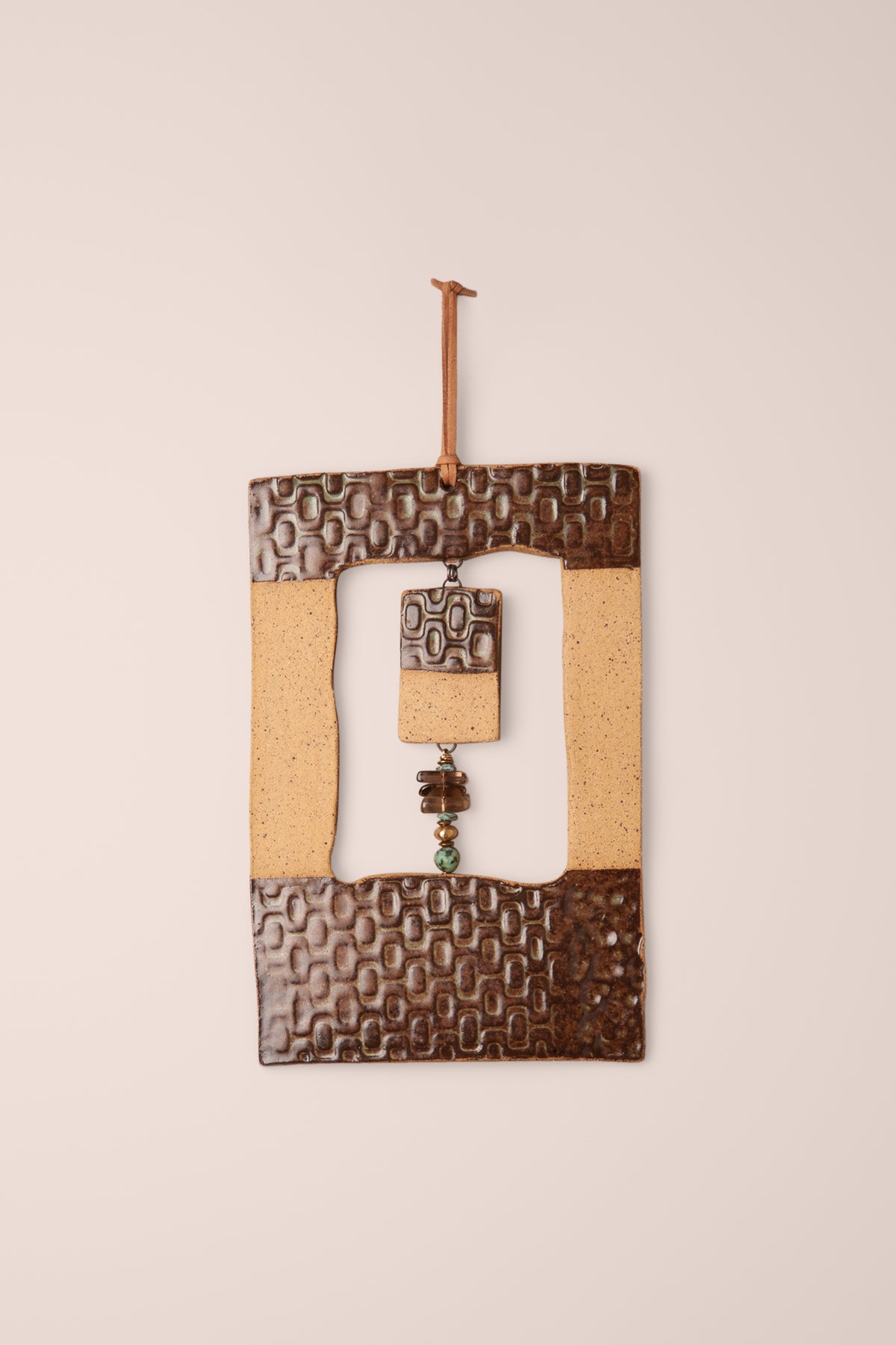 Large handmade rectangle ceramic wall hanging in Antique Aquamarine glaze with pressed pattern bands and a smoky topaz and turquoise dangle, kiln fired by Jester Swink Santa Cruz Mountains — From the Fire FTF_1026