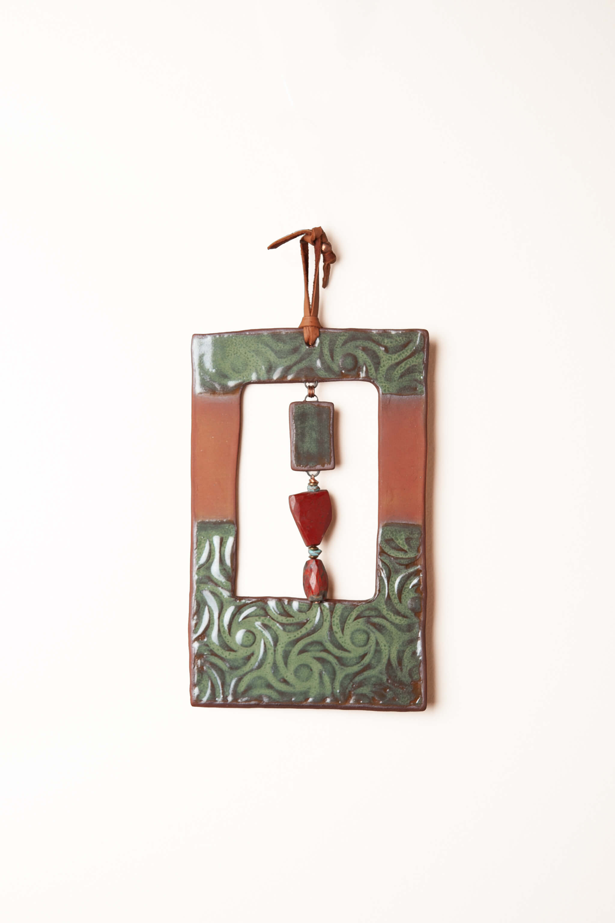 Medium handmade rectangle ceramic wall hanging in antique aquamarine and terracotta with swirl pattern and jasper, kiln fired by Jester Swink Santa Cruz Mountains — From the Fire FTF_0726