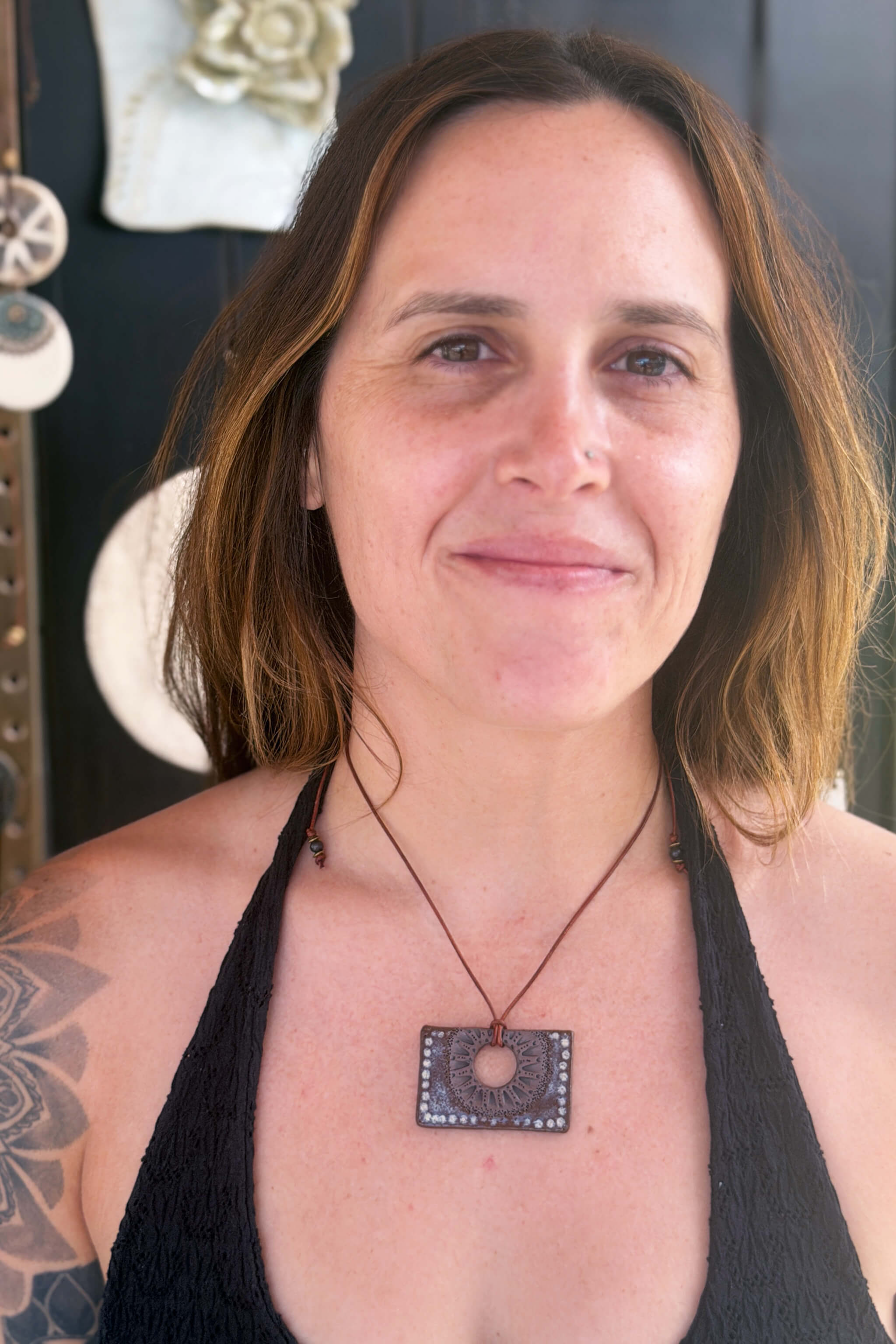 Handmade ceramic rectangle talisman pendant necklace worn at long boho length on dark vintage leather — From the Fire FTF_0726 by Jester Swink
