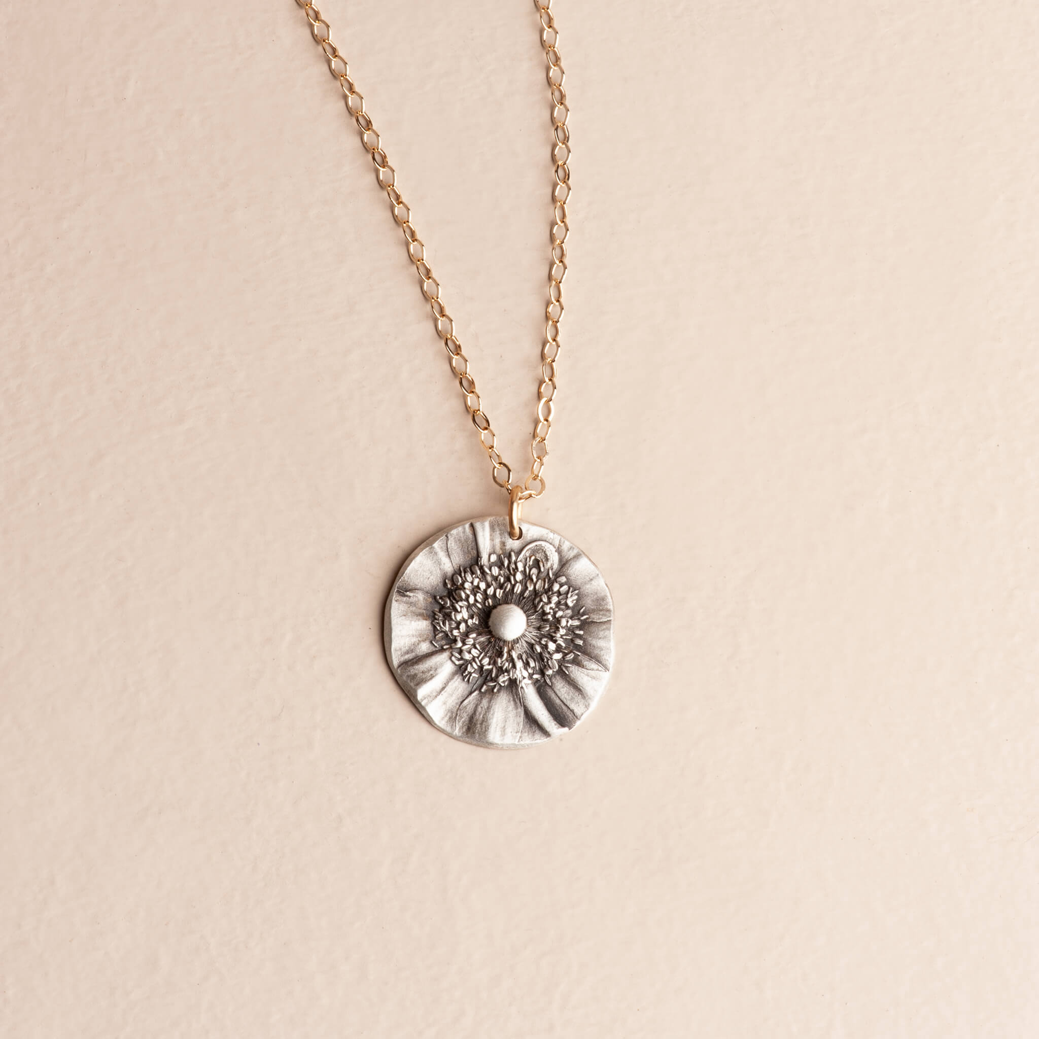 Handcrafted sterling silver Japanese anemone flower pendant necklace — nature-inspired artisan jewelry by Jester Swink, Santa Cruz Mountains California