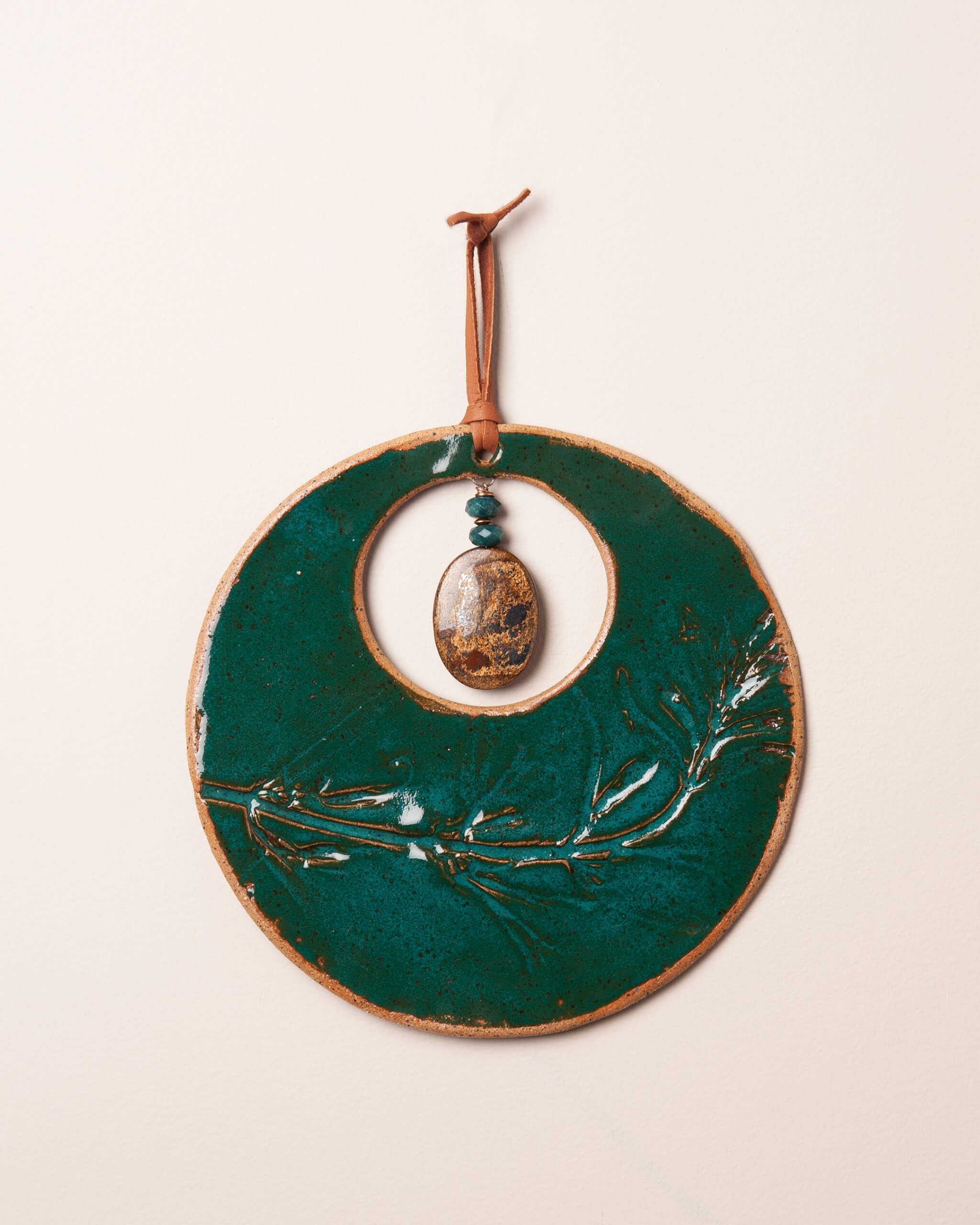merald Wildflower Moon handmade ceramic wall hanging with monkey flower impression and emerald glaze, made in the Santa Cruz Mountains of California