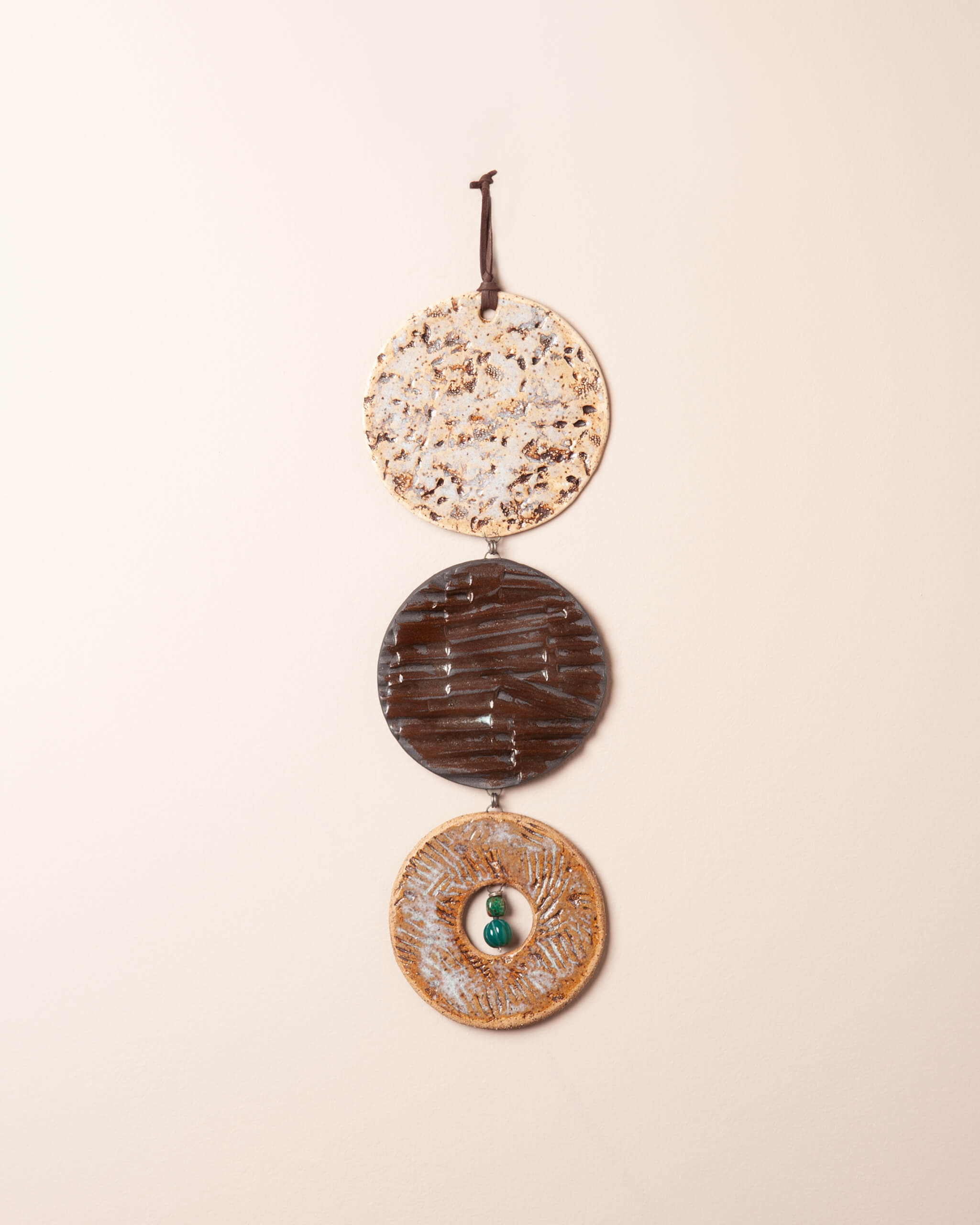 Terra Strata Cascade handmade ceramic wall hanging with three clay bodies, abalone coral and redwood needle impressions, made in the Santa Cruz Mountains of California