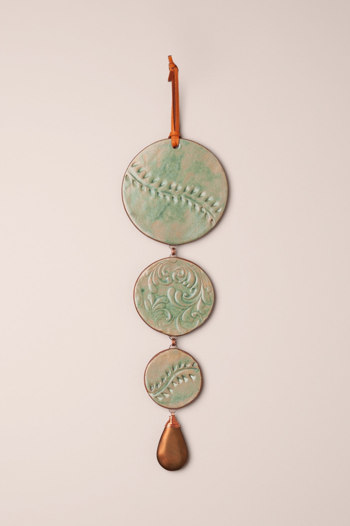 Large handmade tiered ceramic wall hanging in Malachite glaze with three stepped discs and a copper and turquoise teardrop, kiln fired by Jester Swink Santa Cruz Mountains — From the Fire FTF_1026