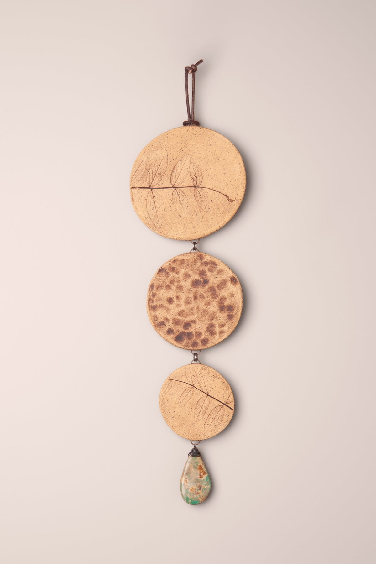 Large handmade tiered ceramic wall hanging in raw Laguna speckled buff clay with underglaze and a turquoise teardrop, kiln fired by Jester Swink Santa Cruz Mountains — From the Fire FTF_1026