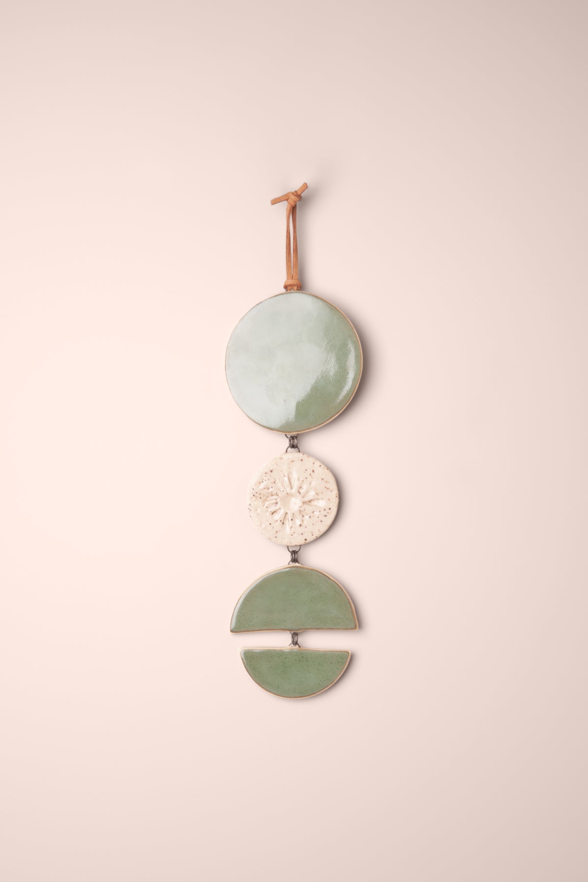 Large handmade tiered ceramic wall hanging in Seafoam glaze with a full moon, pressed sunburst and two half moons, kiln fired by Jester Swink Santa Cruz Mountains — From the Fire FTF_1026