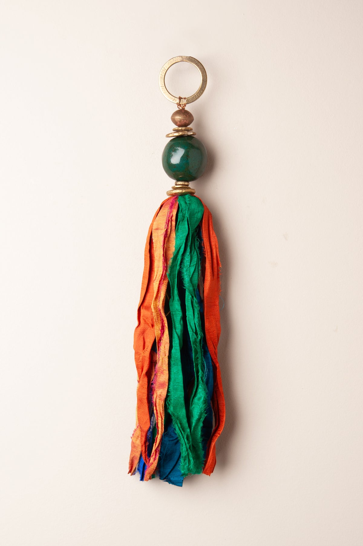Large handmade windcatcher with an emerald glazed ceramic bead, raw silk tassel and brass ring, kiln fired by Jester Swink Santa Cruz Mountains — From the Fire FTF_1026