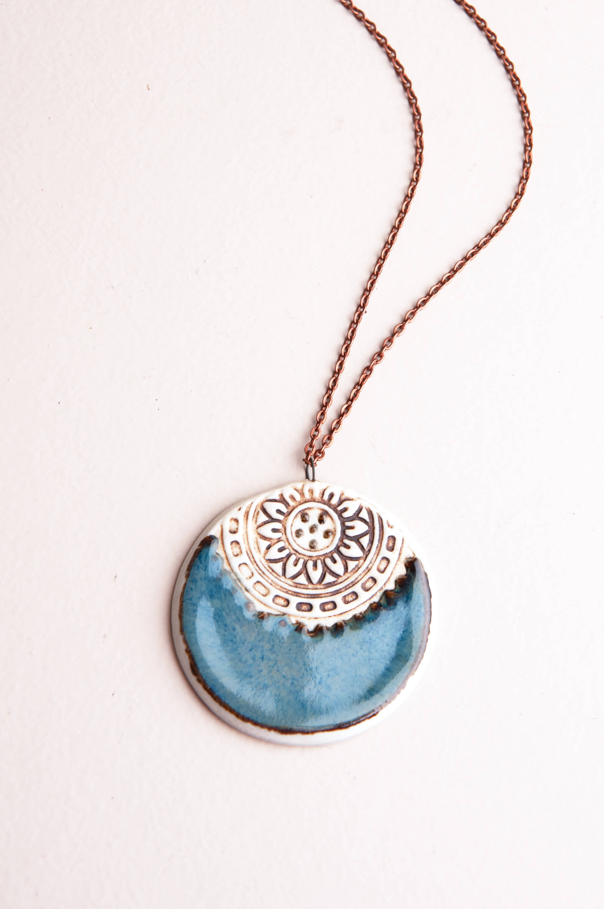 Handmade porcelain mandala ceramic pendant necklace in sea breeze blue and matte white on an 18 inch copper chain, kiln fired by Jester Swink Santa Cruz Mountains — From the Fire FTF_0726