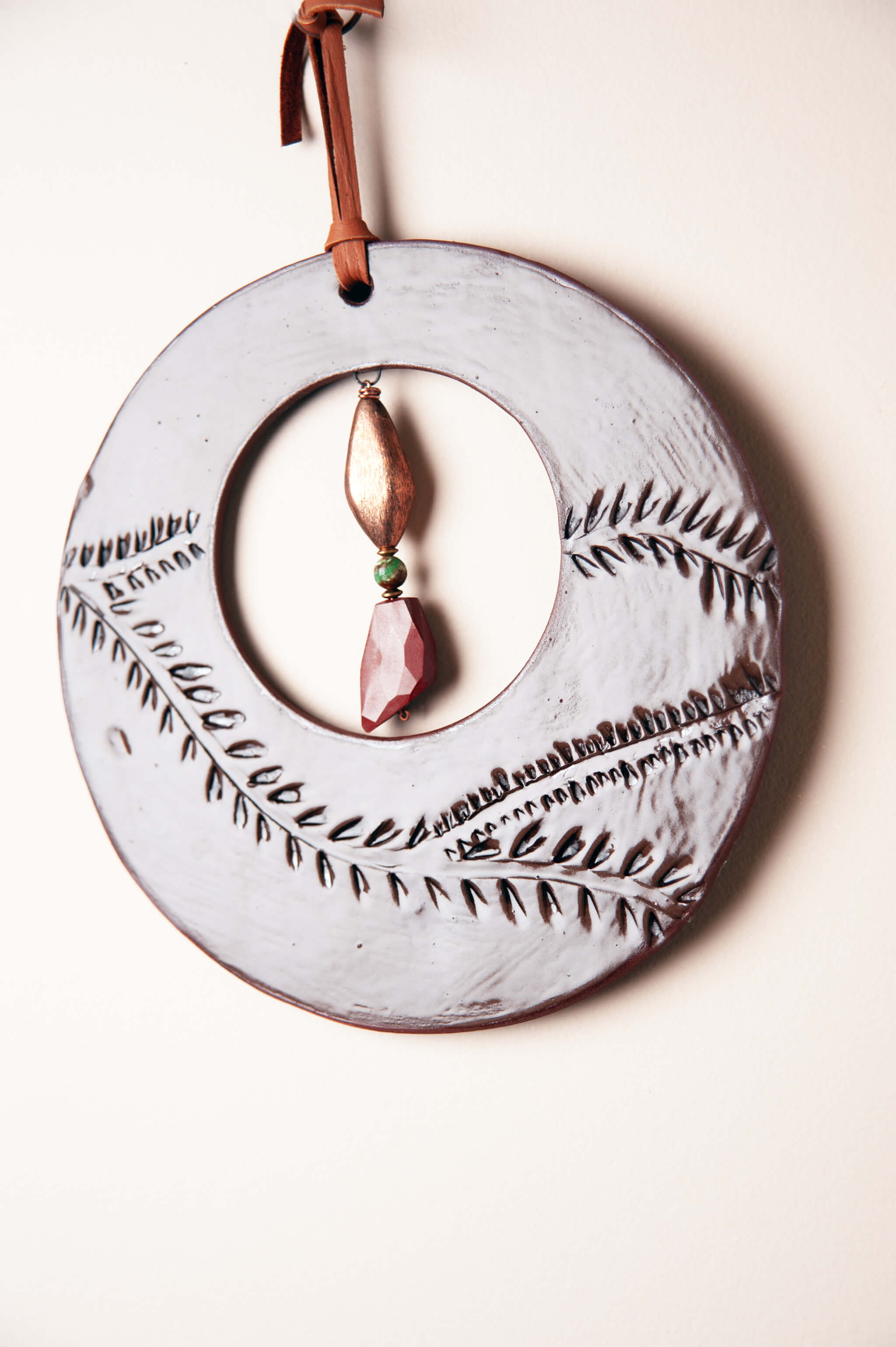 Chrysoprase and jasper suspended on copper inside medium handmade ceramic wall art From the Fire FTF_0726 by Jester Swink