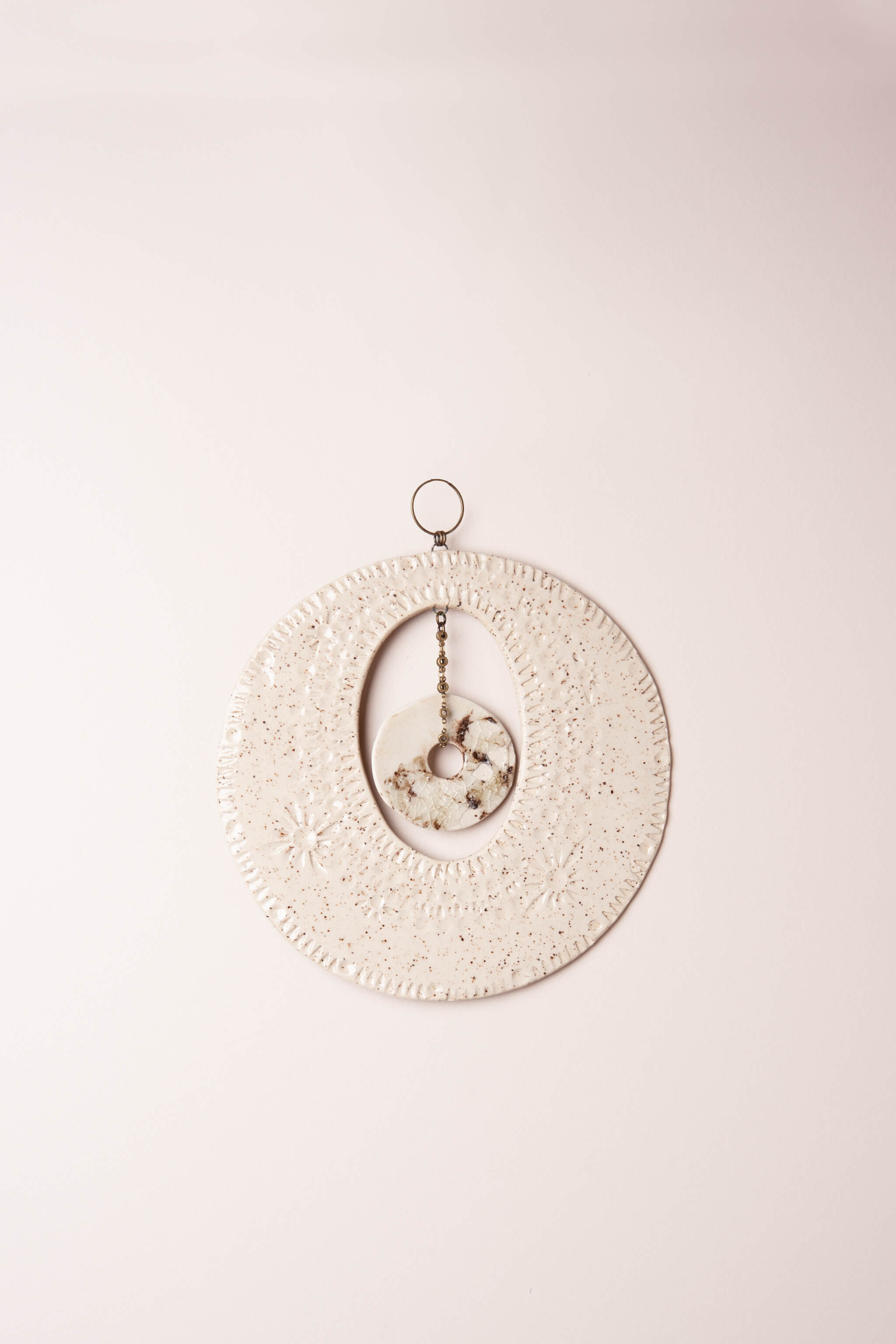 Medium handmade natural wall hanging in speckled white, modern coastal wall art with crackled porcelain pendant on brass chain, kiln fired by Jester Swink Santa Cruz Mountains — From the Fire FTF_0726