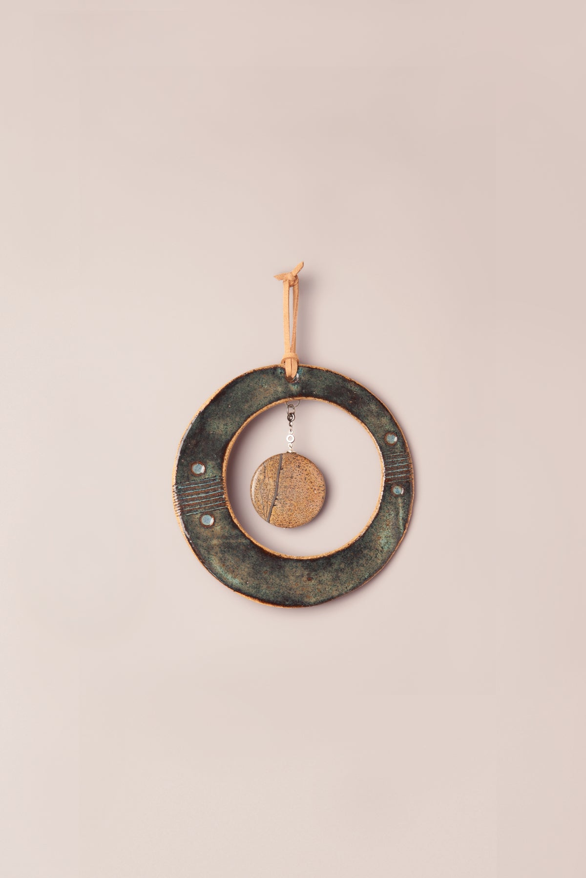 Small handmade circle ceramic wall hanging in Sea Breeze glaze with a picture jasper disc, kiln fired by Jester Swink Santa Cruz Mountains — From the Fire FTF_1026